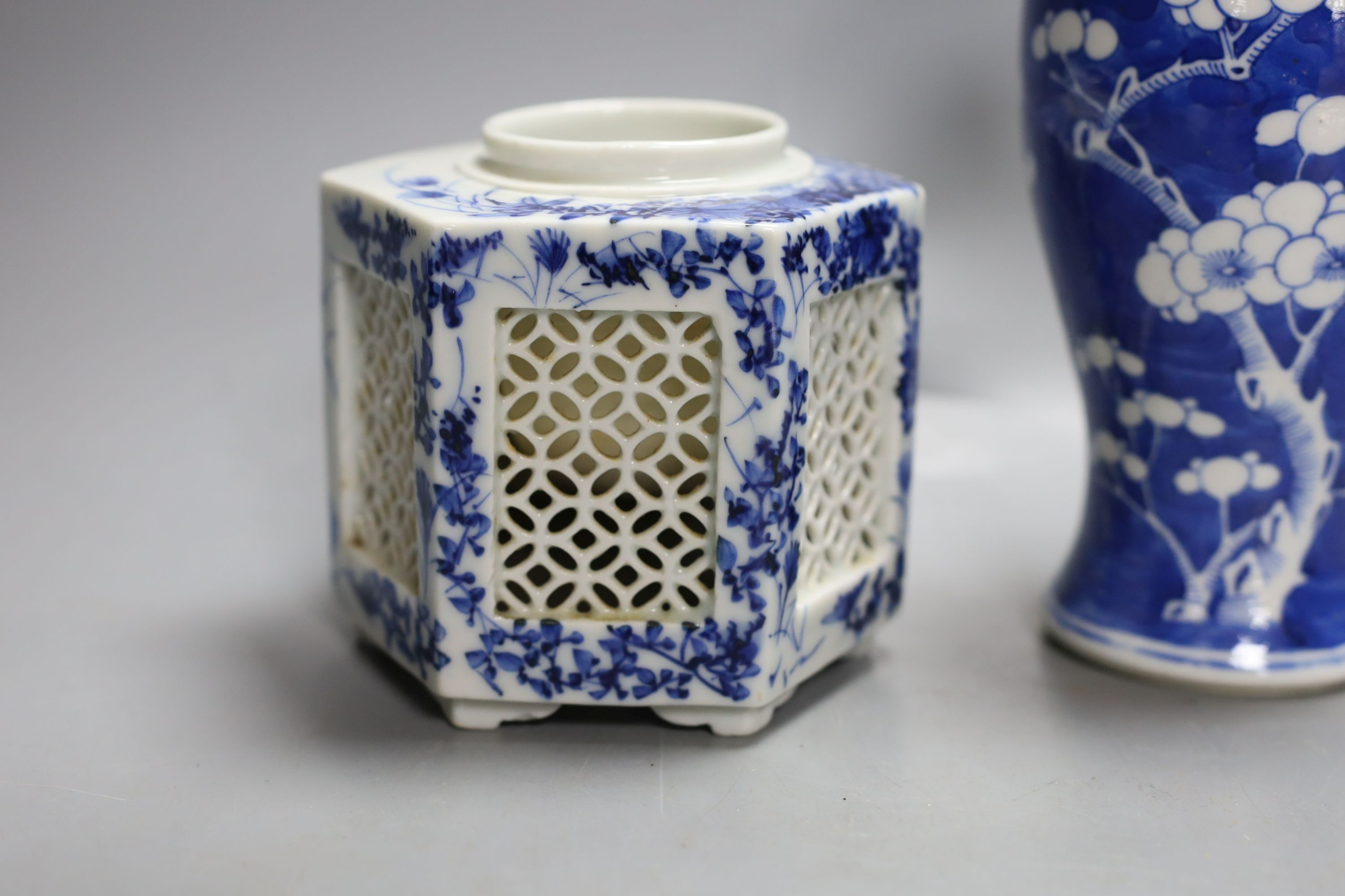 A Chinese blue and white prunus vase, four character mark, height 19cm and two other blue and white items (3)